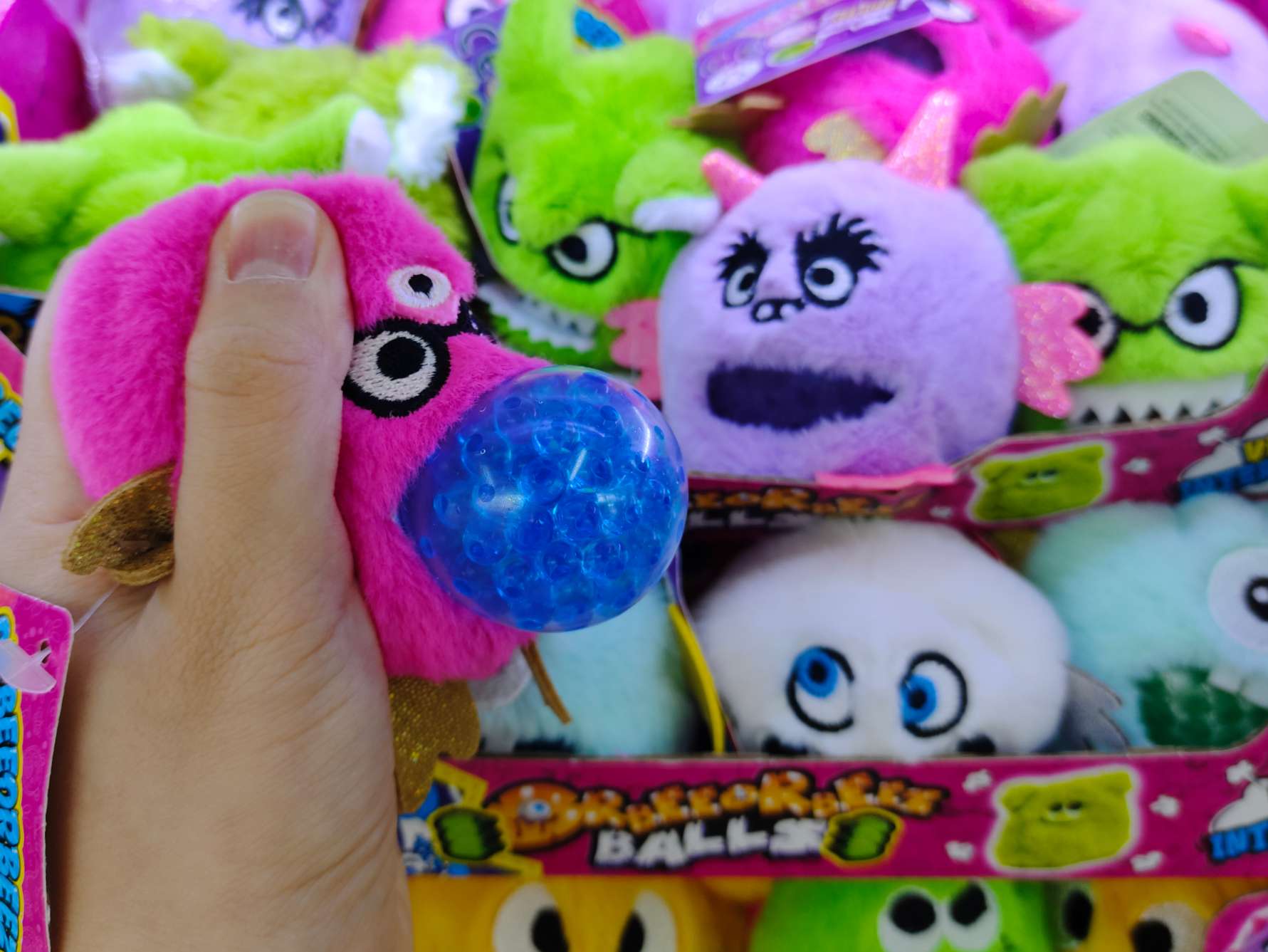 Cute plush stress-relieving pinching ball plush toy, monster series bead-spitting toy, stress-relieving toy, creative and trendy toy display box packaging detail image 8