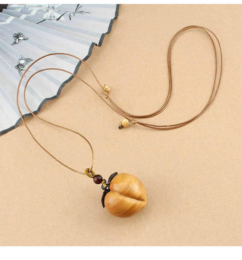 复古文艺植物果实型木质吊坠项链女简约小众编织长款毛衣链配饰品详情8
