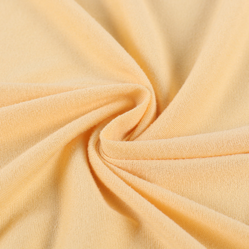 Milk silk pull frame knitted four-sided elastic T-shirt, yoga sportswear fabric, single-sided brushed polyester ammonia milk silk Item Picture
