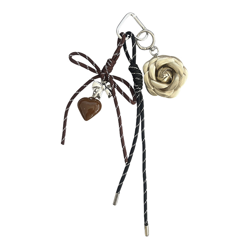Fashionable and creative Korean-style camellia hand-woven rope heart keychain decorative pendant, car key chain, bag pendant details Picture