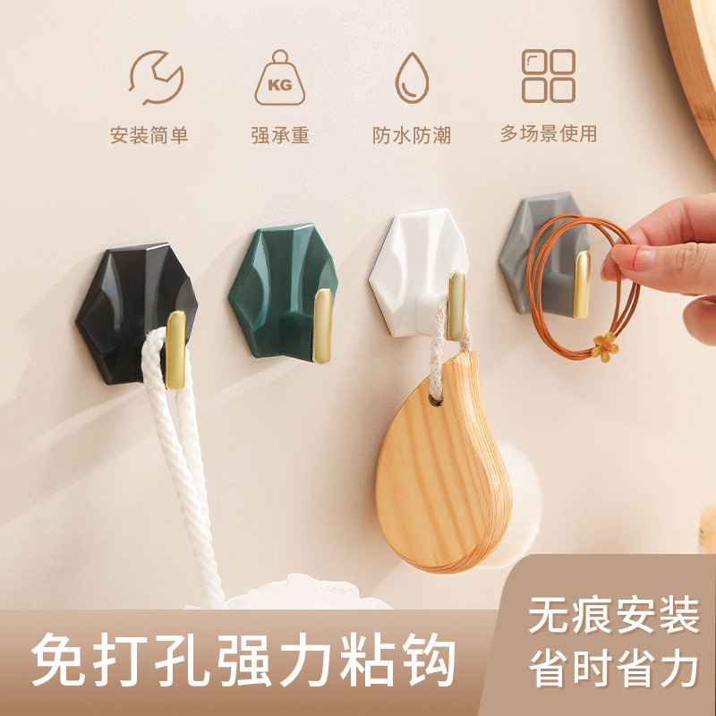 Gancho geométrico sin perforación hogar cocina pequeño gancho pegajoso bolsa de llaves detrás de la puerta gancho sin traza cross-over venta caliente luz extravagancia Specification image