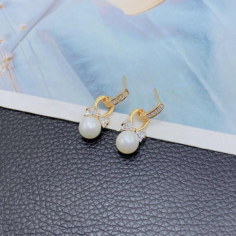 Pearl bow earrings, sweet and unique Korean earrings for women, 2026 new trendy and fashionable French style earrings