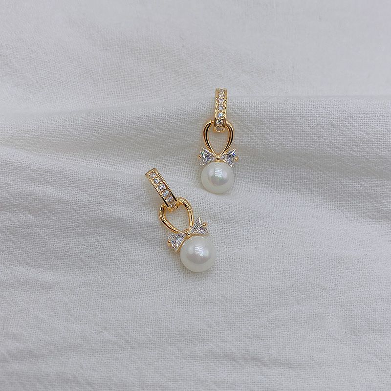 Pearl bow earrings, sweet and unique Korean earrings for women, 2026 new trendy and fashionable French style earrings detail image 5