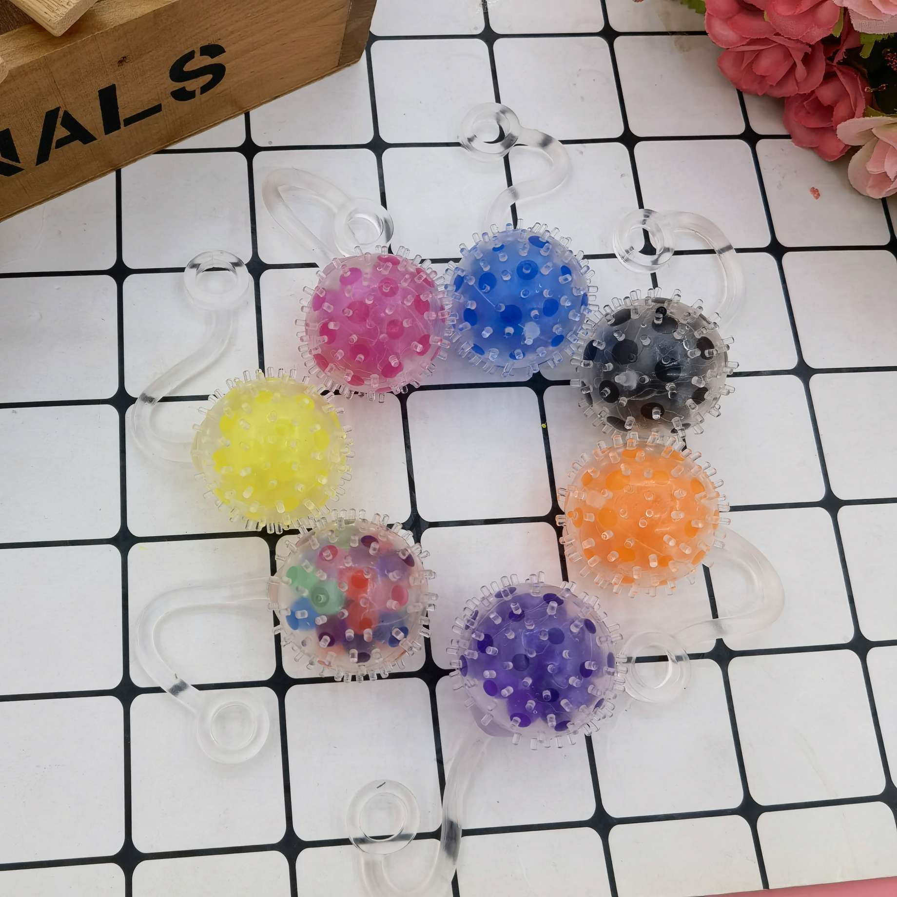 跨境3.5cm毛刺带绳发泄水珠球彩珠球减压悠悠球发泄玩具厂家产品图