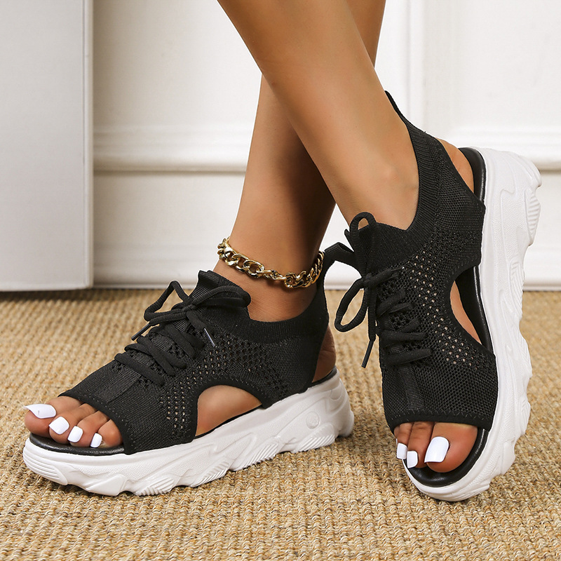Amazon's new large-sized fly-knit thick-soled sandals for women, a fashionable European and American style fish-mouth wedge heel mesh casual sports sandals details Picture