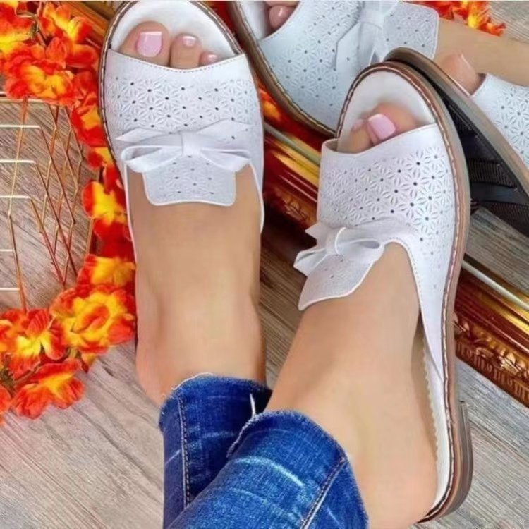 wish, an independent website, offers large-sized women's summer casual sandals with flat, bow-shaped, breathable and fashionable beach slippers Specification drawing