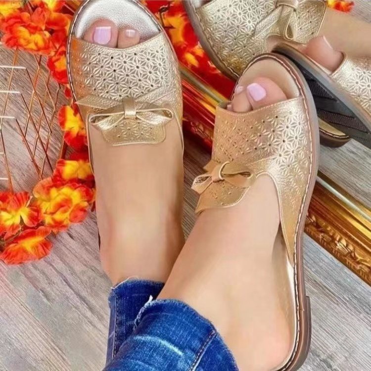 wish, an independent website, offers large-sized women's summer casual sandals with flat, bow-shaped, breathable and fashionable beach slippers details Picture
