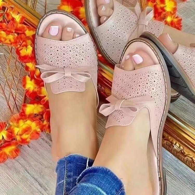 wish, an independent website, offers large-sized women's summer casual sandals with flat, bow-shaped, breathable and fashionable beach slippers full figure