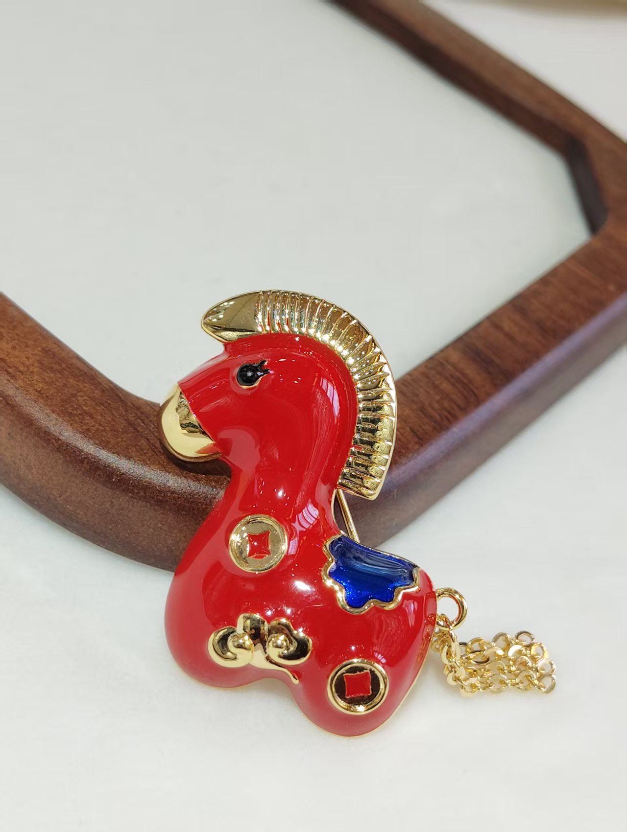 A red little horse brooch for the zodiac year Application Scenario