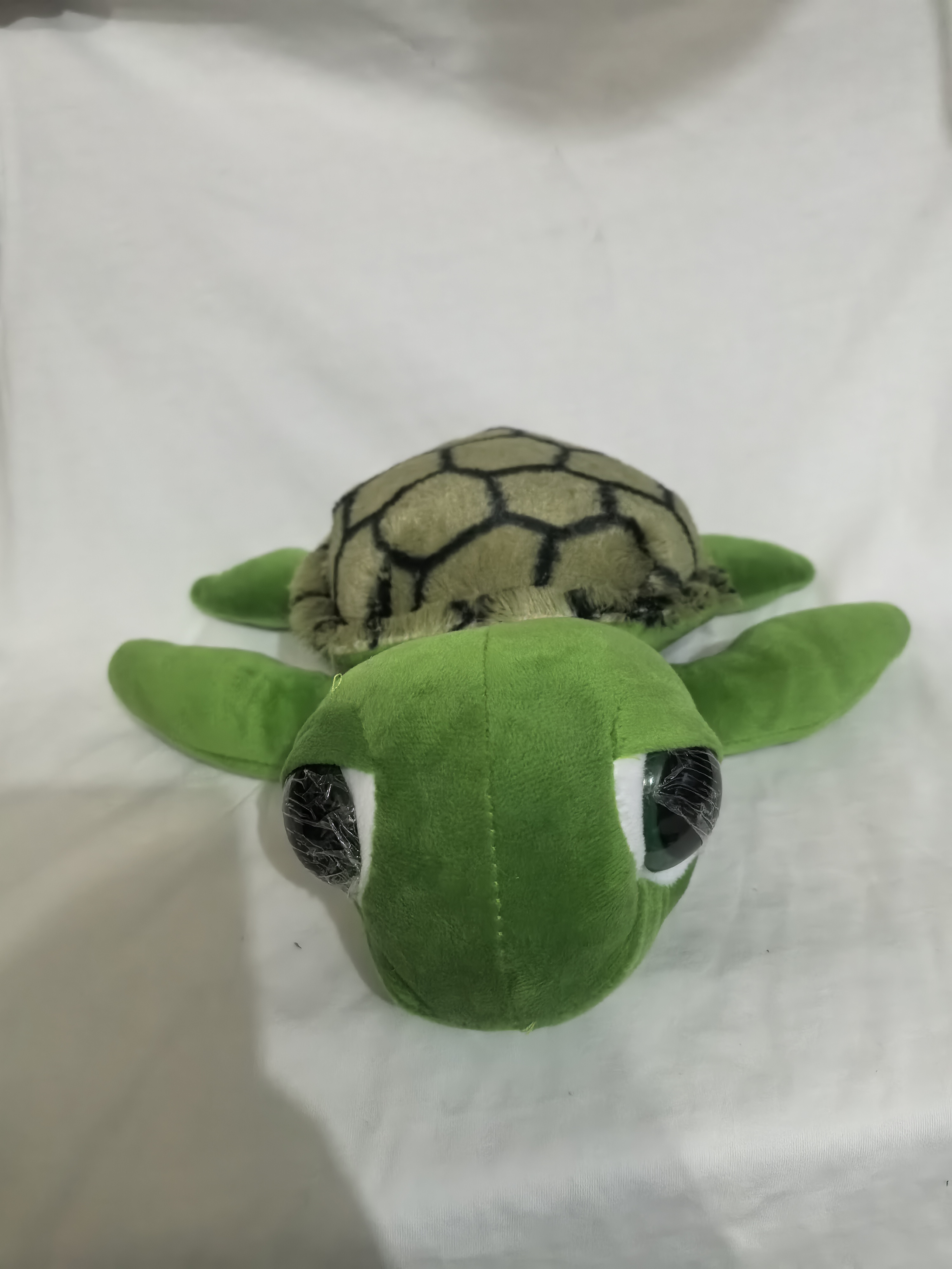 Cartoon big-eyed turtle with multi-color mixed colors