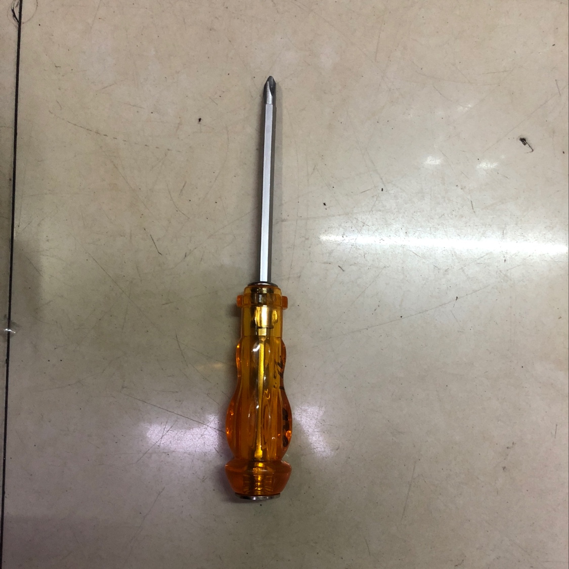 Portable flat-head screwdriver with plastic handle