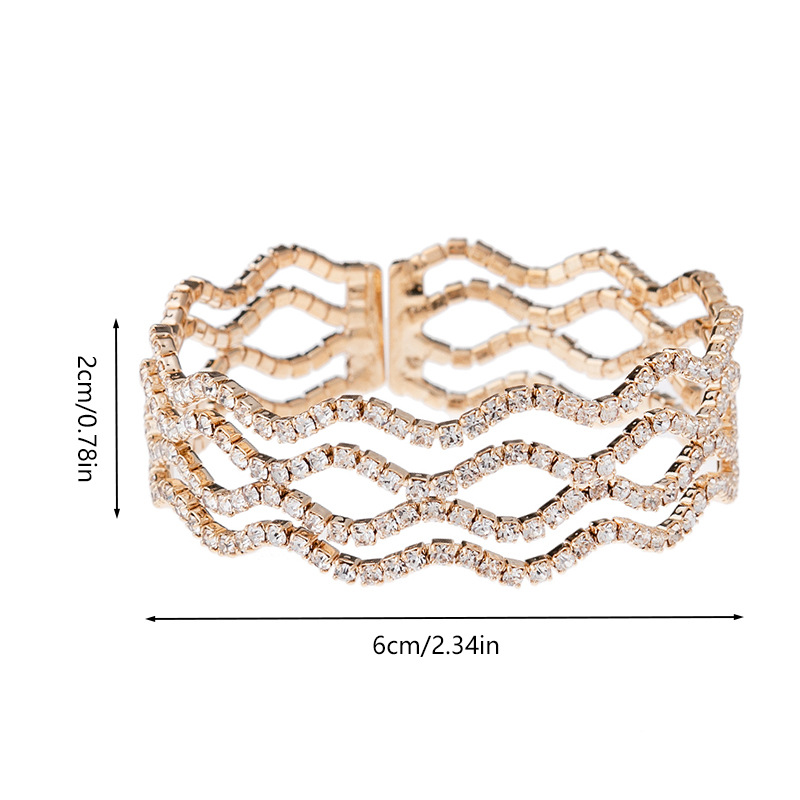 This 4-row wavy elastic water diamond bracelet from Europe and America is a versatile and elegant choice for banquets. It is an open steel wire elastic bracelet accessory for women Item Picture