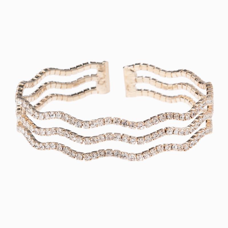 The manufacturer supplies cross-border classic 3-row wavy elastic water diamond bracelet for women, with a European and American style. It is a round opening steel wire elastic design sense jewelry details Picture