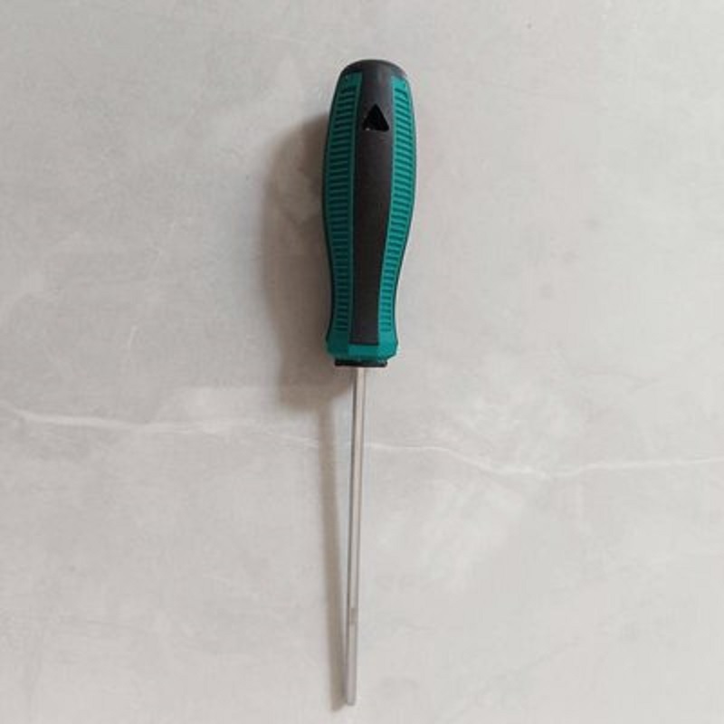 A green screwdriver with a peanut handle