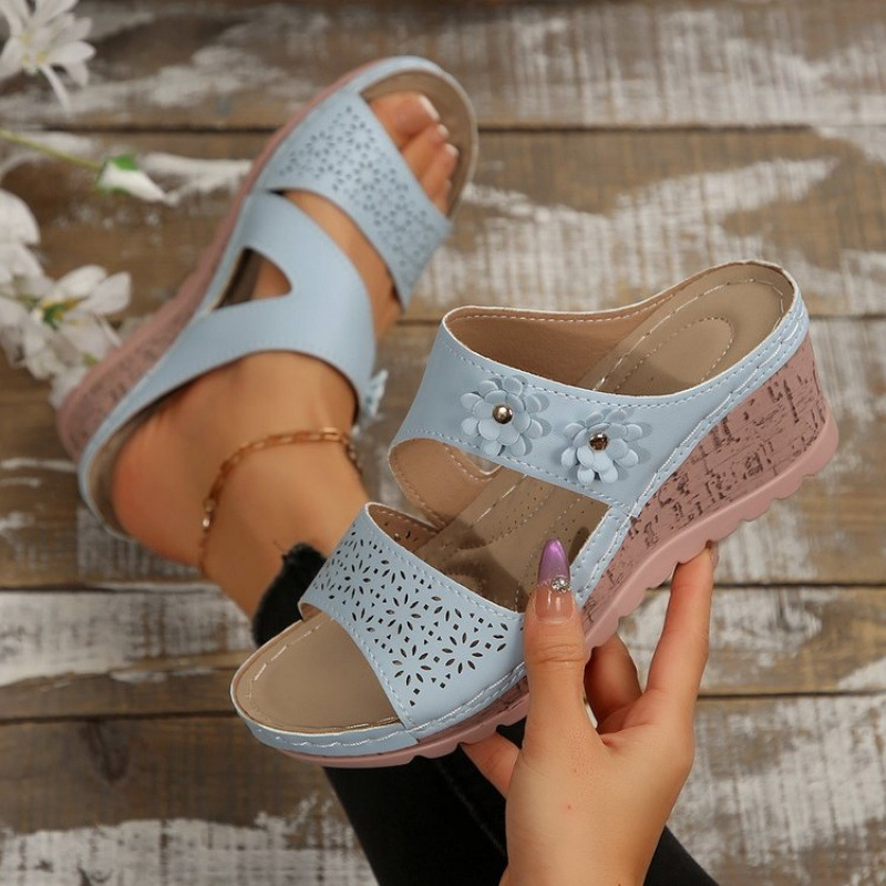 In the summer of 2025, new cross-border wedge heel thick-soled women's slippers are available for export. They are one-line wedge heel slippers with flower decorations Application Scenario