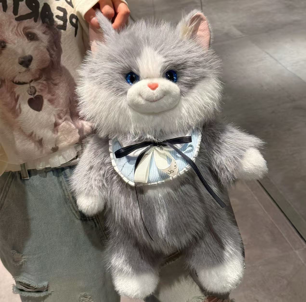 Cute bib stuffed cat backpack Item Picture