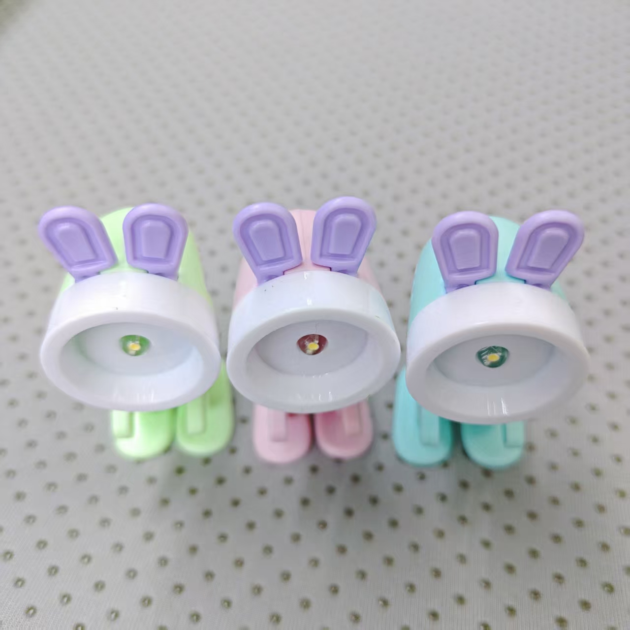 Cute rabbit-shaped night lights available in five colors, both adorable and practical, lighting up a warm night. Factory wholesale