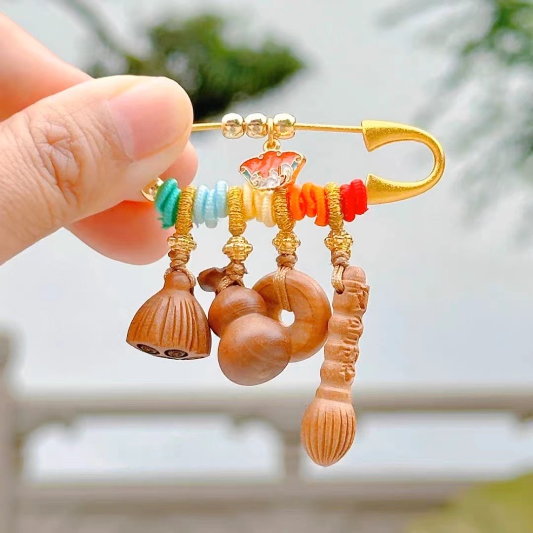 Wholesale of peach wood Wenchang pen landing brooches from the manufacturer Application Scenario