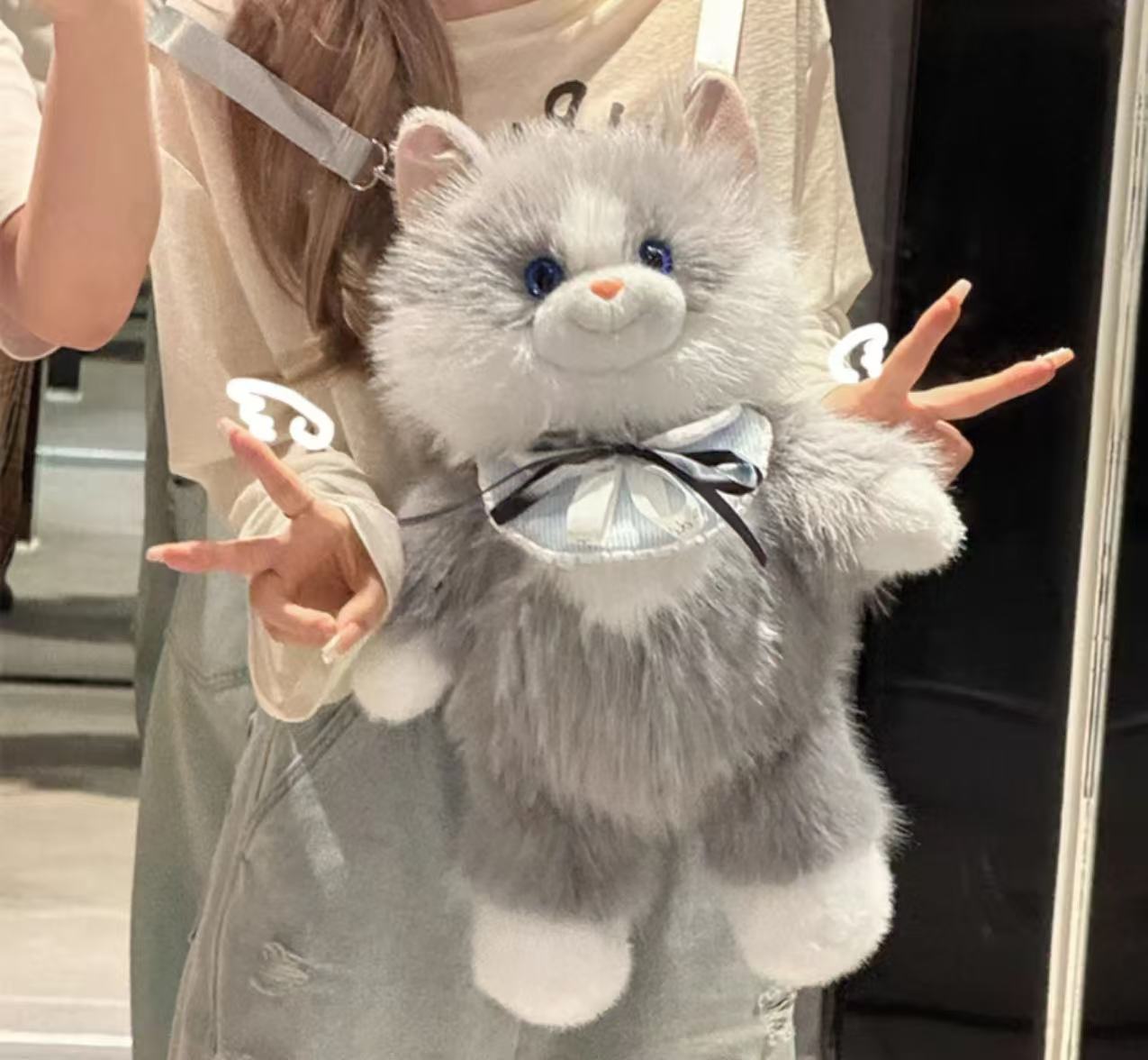 Cute bib stuffed cat backpack Application Scenario