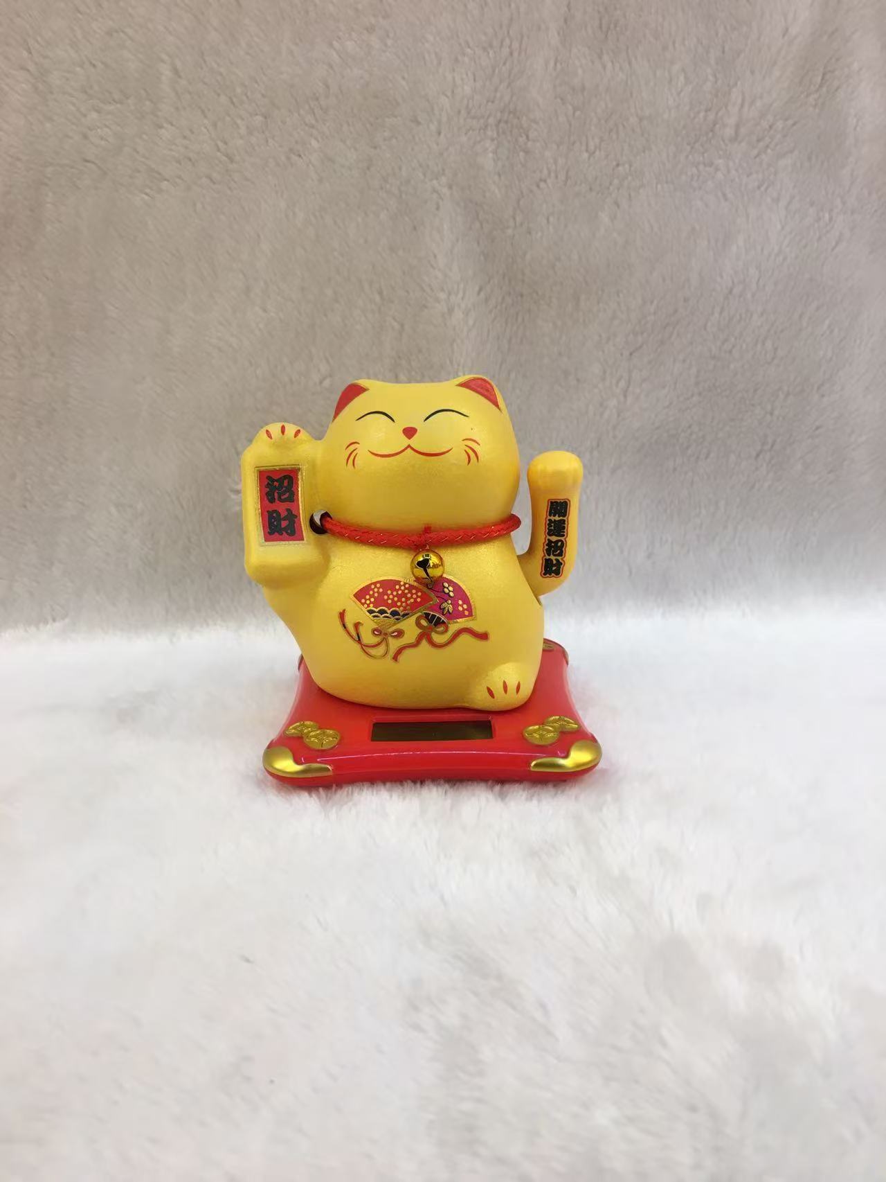 新款光感自动摇手猫车载办公桌摆件