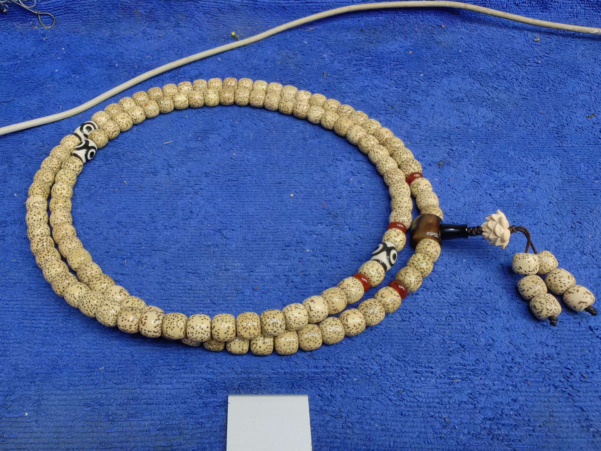 Wholesale of original ecological Hainan chicken oil Yellow Star moon beads 108 long strings of old bucket golden seed cultural play Buddhist prayer beads for men details Picture