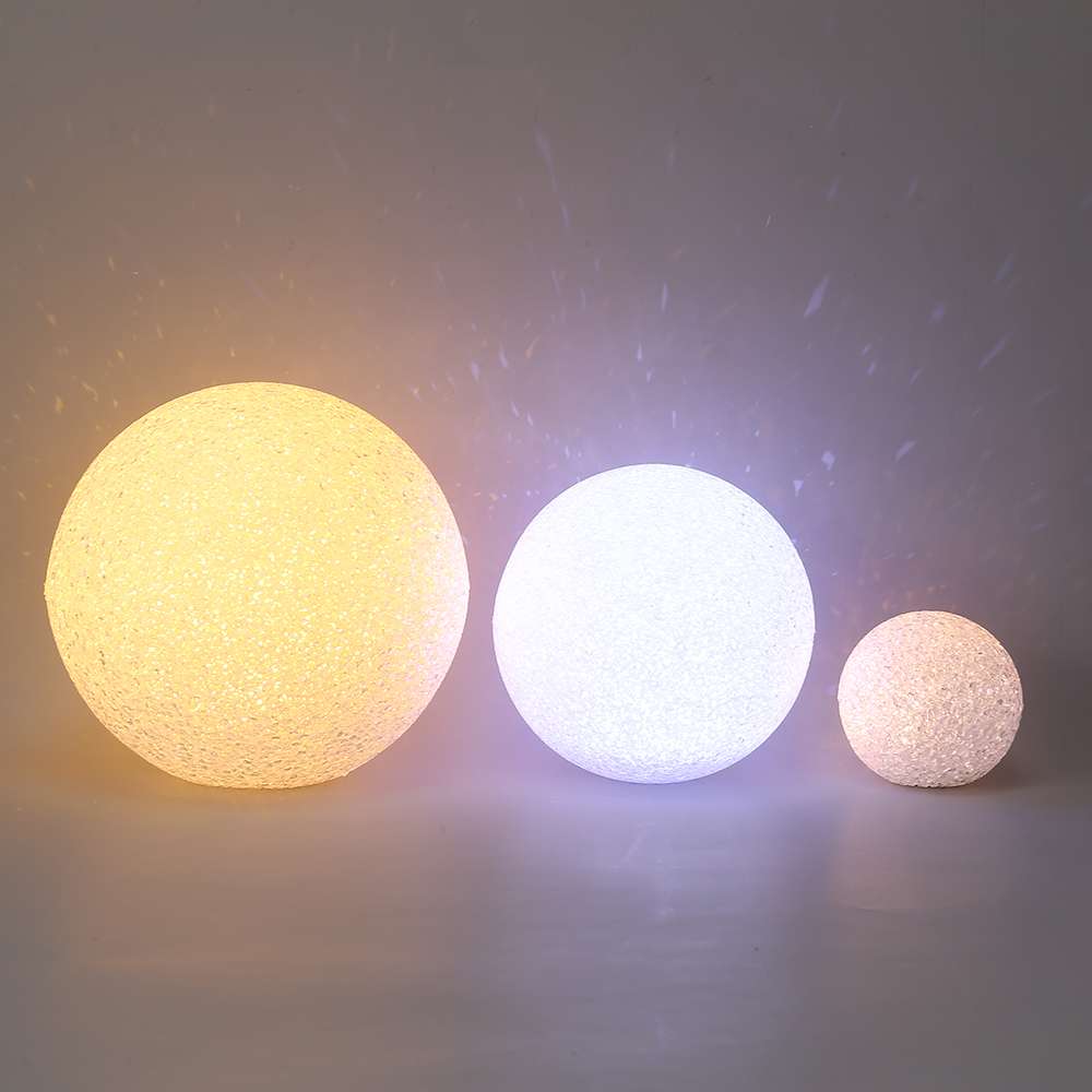 Holding a glowing round ball lamp, performing dance and chorus on stage; holding a crystal ball lamp, prop lamp, program performance, and creative atmosphere lamp