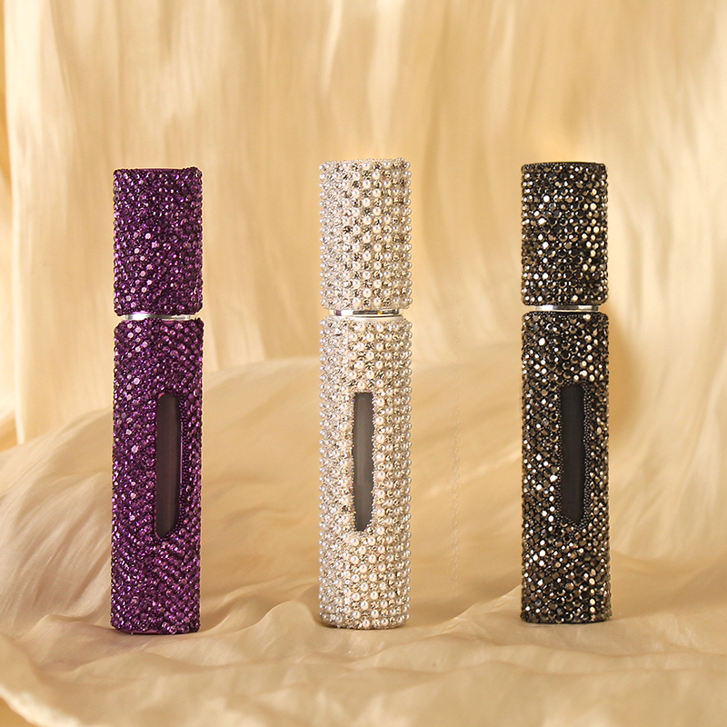 Cross-border diamond-encrusted 8ml perfume sub-bottle bottom self-pump portable spray high appearance level filling bottle beauty and daily chemical packaging
