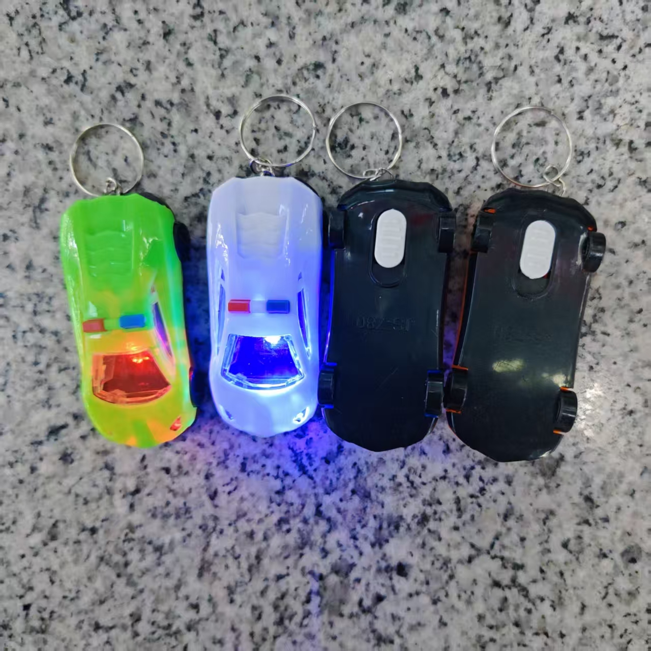 The four-color JS-780 flashing toy keychain light is so cute and fun that it lights up your daily life. Factory wholesale details Picture