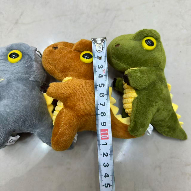 Tres colores dinosaurio bebé mascota animal de peluche muñeca de recuerdo colgante de alrededor de la caricatura colgante de peluche llavero muppet colgante adorable decoración clip de regalo máquina de muñeca fábrica venta directa Specification image