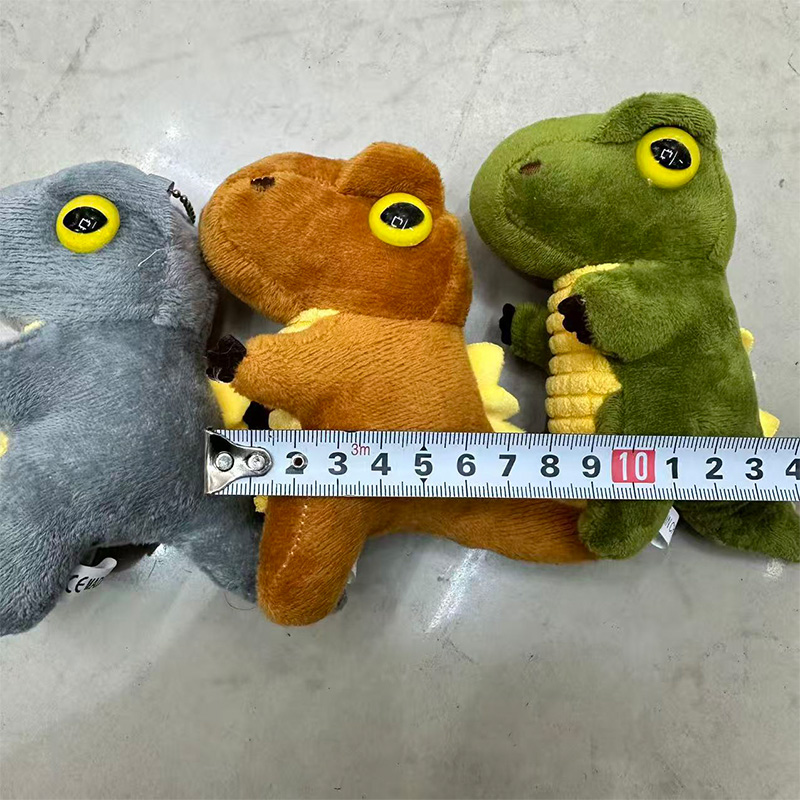 Tres colores dinosaurio bebé mascota animal de peluche muñeca de recuerdo colgante de alrededor de la caricatura colgante de peluche llavero muppet colgante adorable decoración clip de regalo máquina de muñeca fábrica venta directa Application Scenario