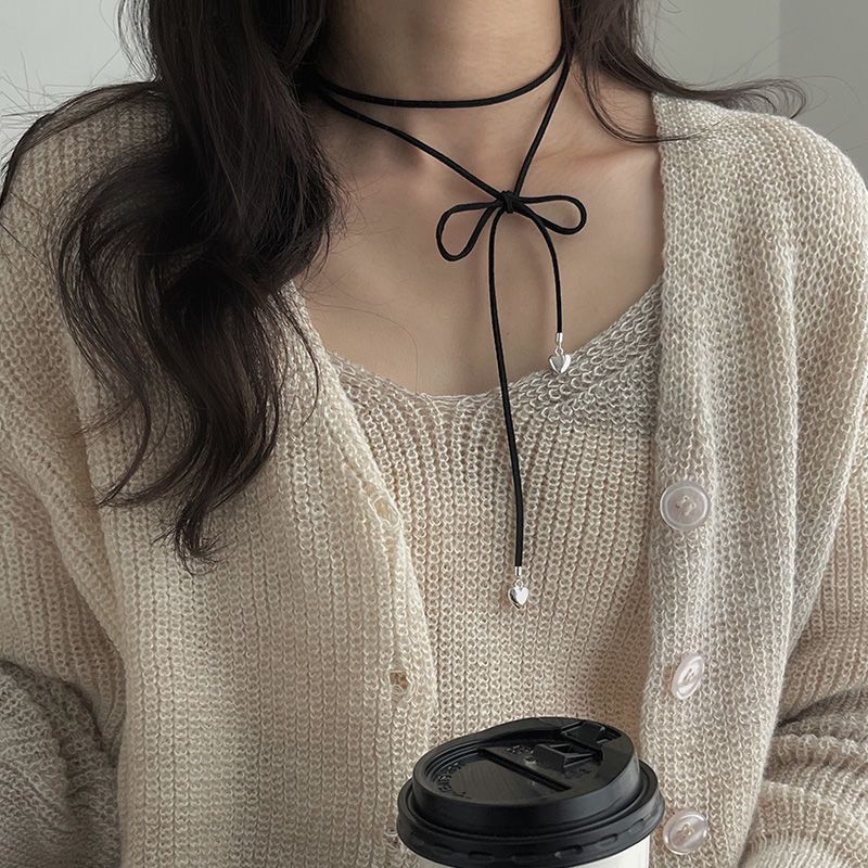 Bow choker necklace, black rope heart necklace, extended sweater chain strap, multiple wearing methods can be adjusted. Bow choker necklace, black rope heart necklace, extended sweater chain strap, multiple ways to wear detail image 6