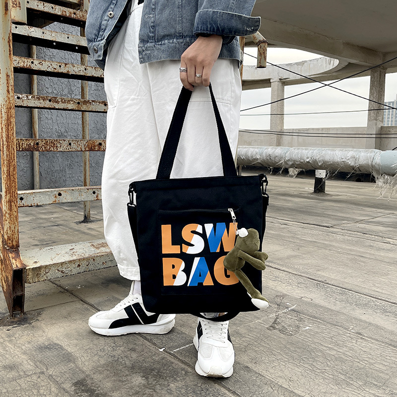 online red western style ins korean style national fashion college student tote bag class canvas bag men and women's one-shoulder tote bag men's bag details Picture