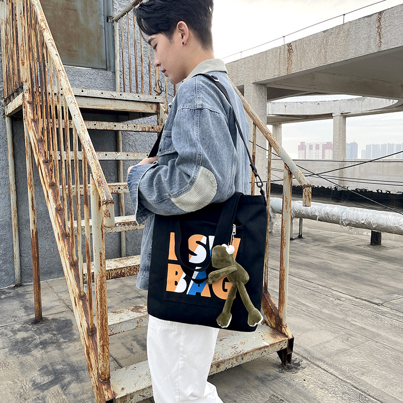 online red western style ins korean style national fashion college student tote bag class canvas bag men and women's one-shoulder tote bag men's bag Application Scenario
