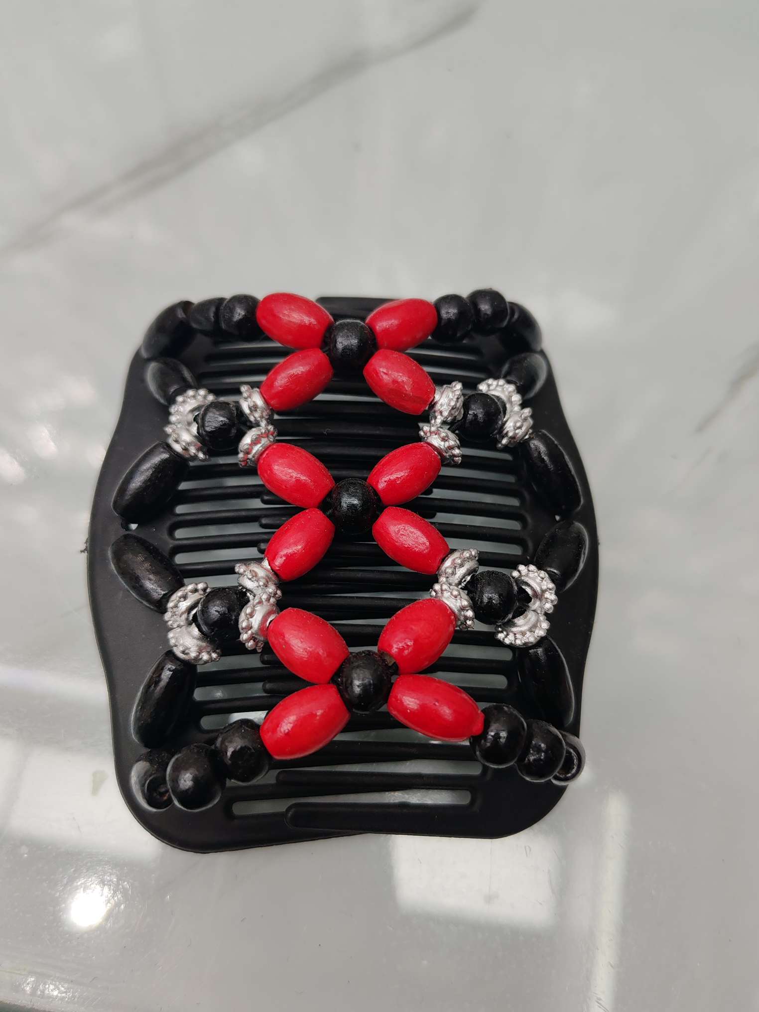 风靡欧美时尚百变木梳，厂家直销，yySP一2025一4，600一件