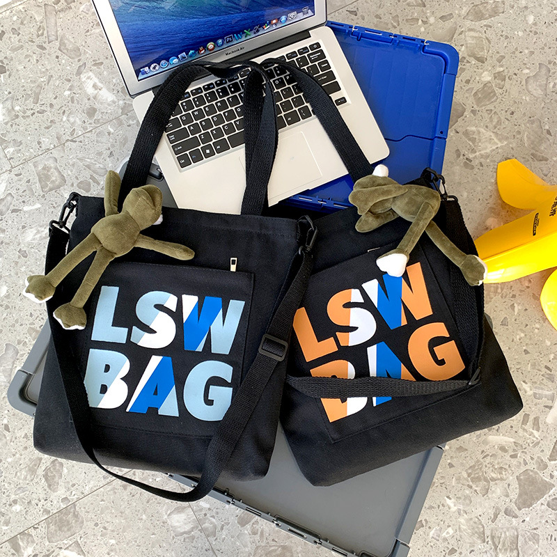 online red western style ins korean style national fashion college student tote bag class canvas bag men and women's one-shoulder tote bag men's bag full figure