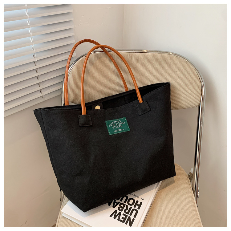 foreign trade wholesale autumn and winter new large capacity single shoulder canvas bag simple portable women's ins big bag solid color tote bag full figure