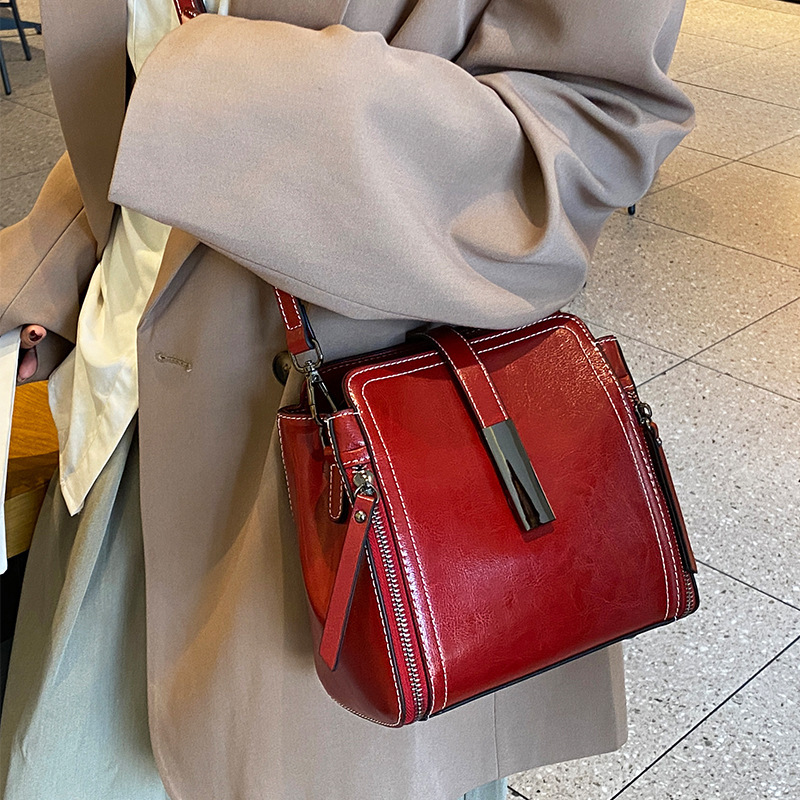 genuine leather retro bucket bag new trendy women's bags high sense fashion commuter handbag leather one-shoulder crossbody bag details Picture