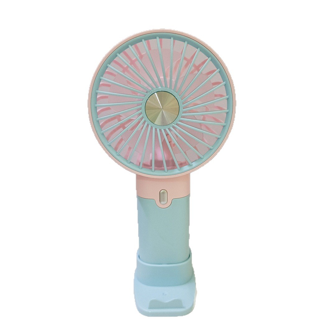 The new simple and mini handheld fan has a strong wind force and can be charged by USB. It is a portable desktop stand for outdoor students Item Picture