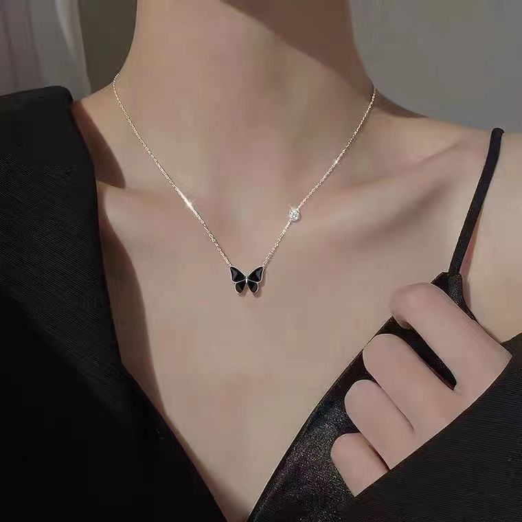 new warm color-changing butterfly necklace female niche design butterfly pendant temperament entry lux all-match female clavicle chain details Picture