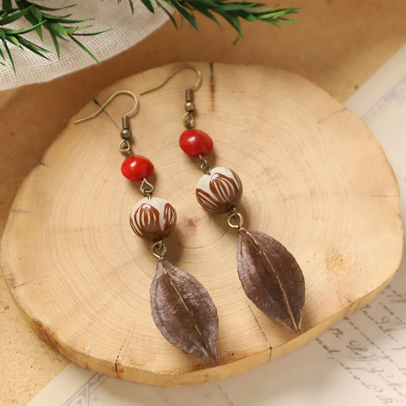 vintage handmade plant fruit earrings mori style pinecone artistic ethnic style chinese medicine dried fruit niche creative earrings female Application Scenario