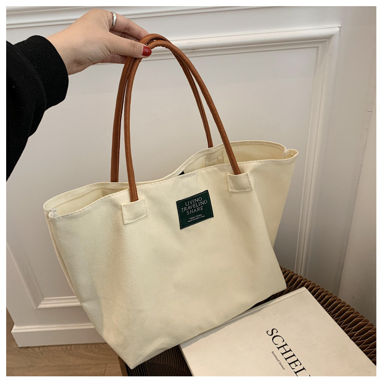 foreign trade wholesale autumn and winter new large capacity single shoulder canvas bag simple portable women's ins big bag solid color tote bag details Picture