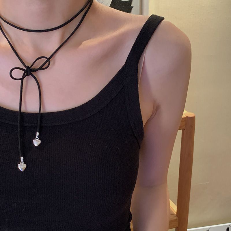 Bow choker necklace, black rope heart necklace, extended sweater chain strap, multiple wearing methods can be adjusted. Bow choker necklace, black rope heart necklace, extended sweater chain strap, multiple ways to wear details Picture
