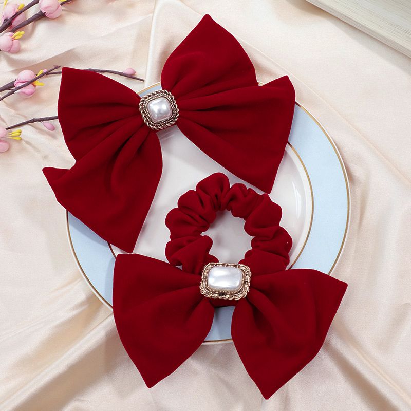 The new red large bow headwear for brides in 2025, the wedding hair tie, the popular hairpin, the back of the head clip, summer detail image 16