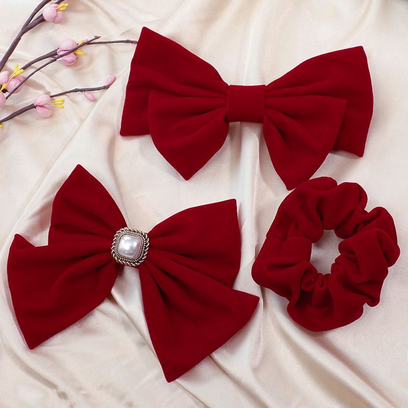 The new red large bow headwear for brides in 2025, the wedding hair tie, the popular hairpin, the back of the head clip, summer detail image 13