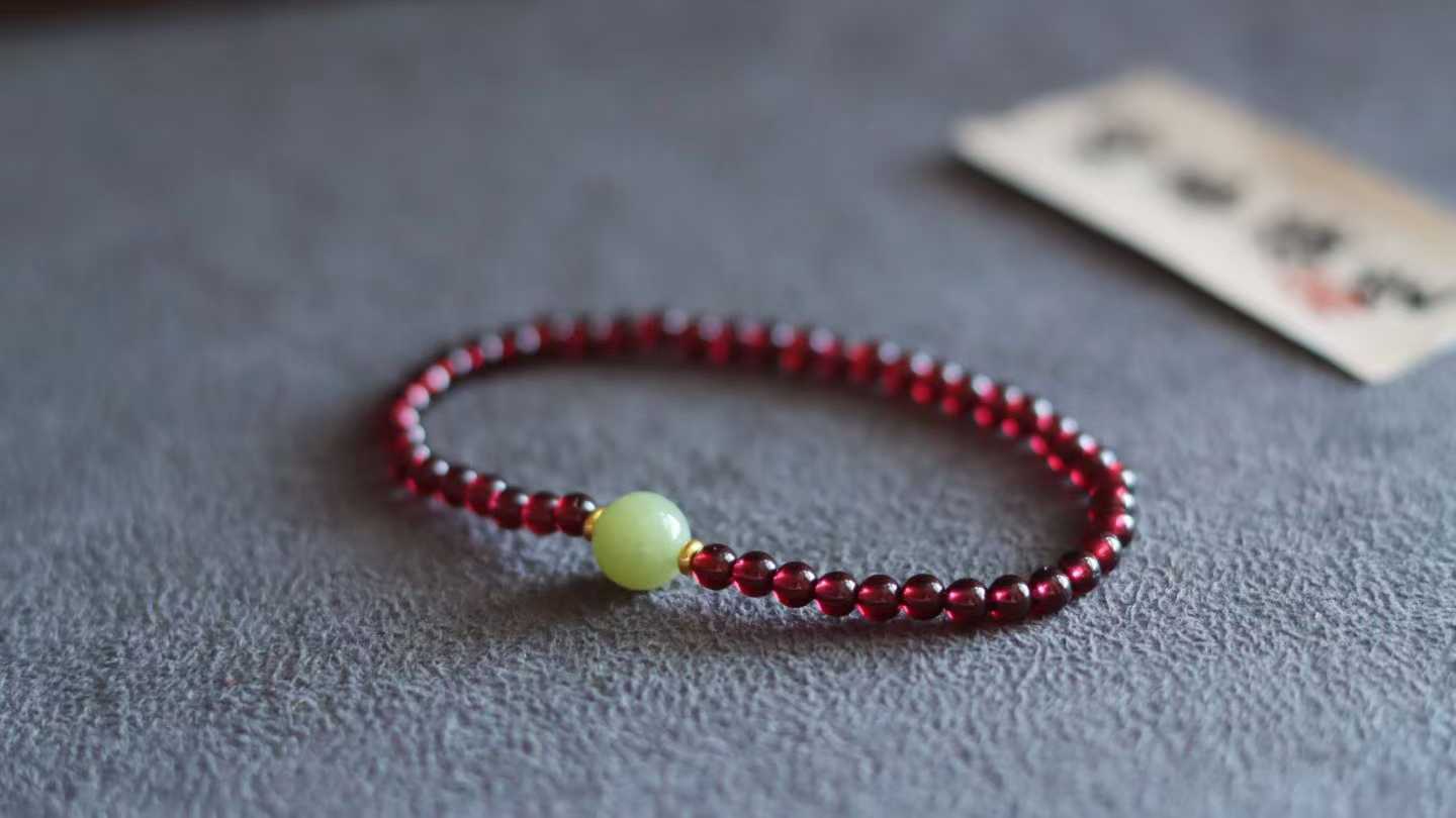 天然紫牙乌石榴石手串