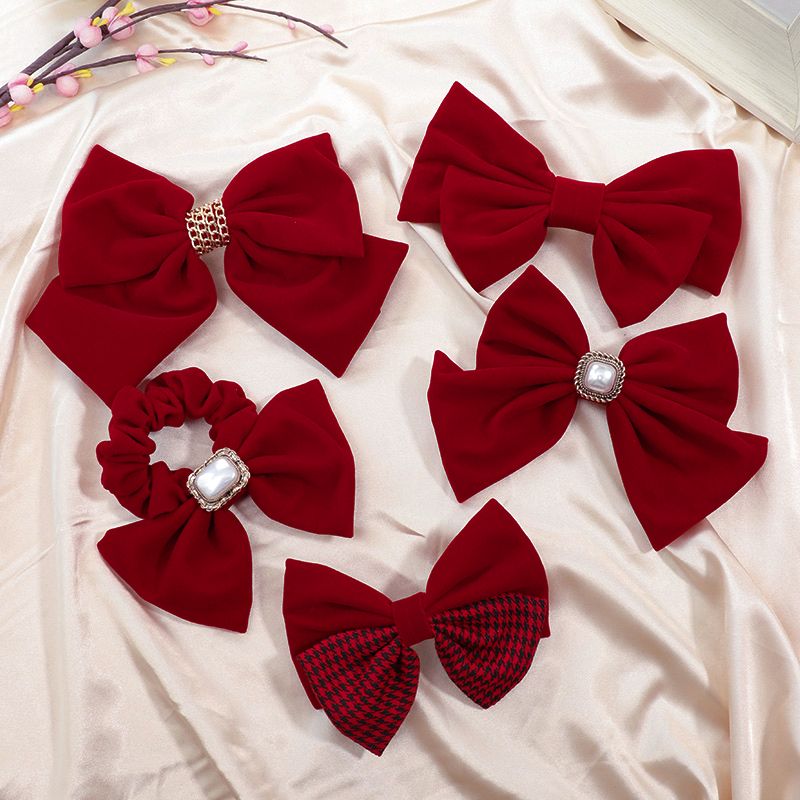 The new red large bow headwear for brides in 2025, the wedding hair tie, the popular hairpin, the back of the head clip, summer Application Scenario