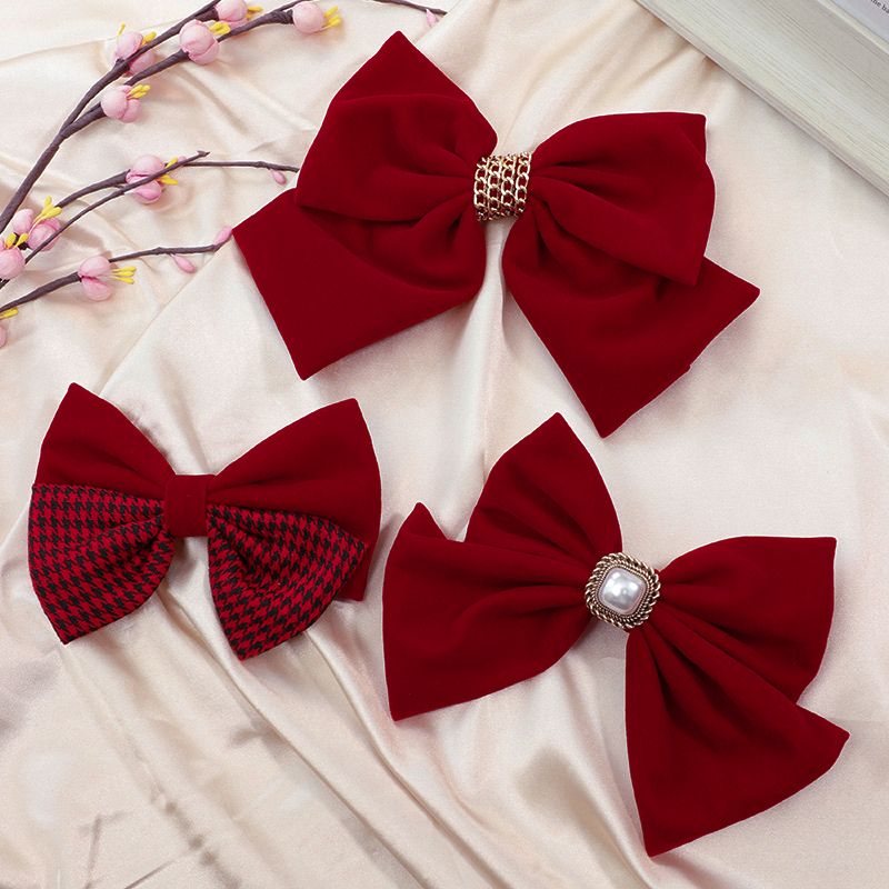 The new red large bow headwear for brides in 2025, the wedding hair tie, the popular hairpin, the back of the head clip, summer detail image 8