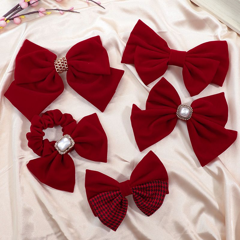 The new red large bow headwear for brides in 2025, the wedding hair tie, the popular hairpin, the back of the head clip, summer detail image 15
