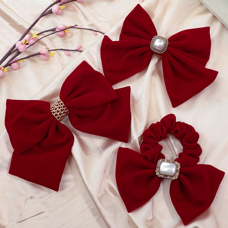 The new red large bow headwear for brides in 2025, the wedding hair tie, the popular hairpin, the back of the head clip, summer detail image 6