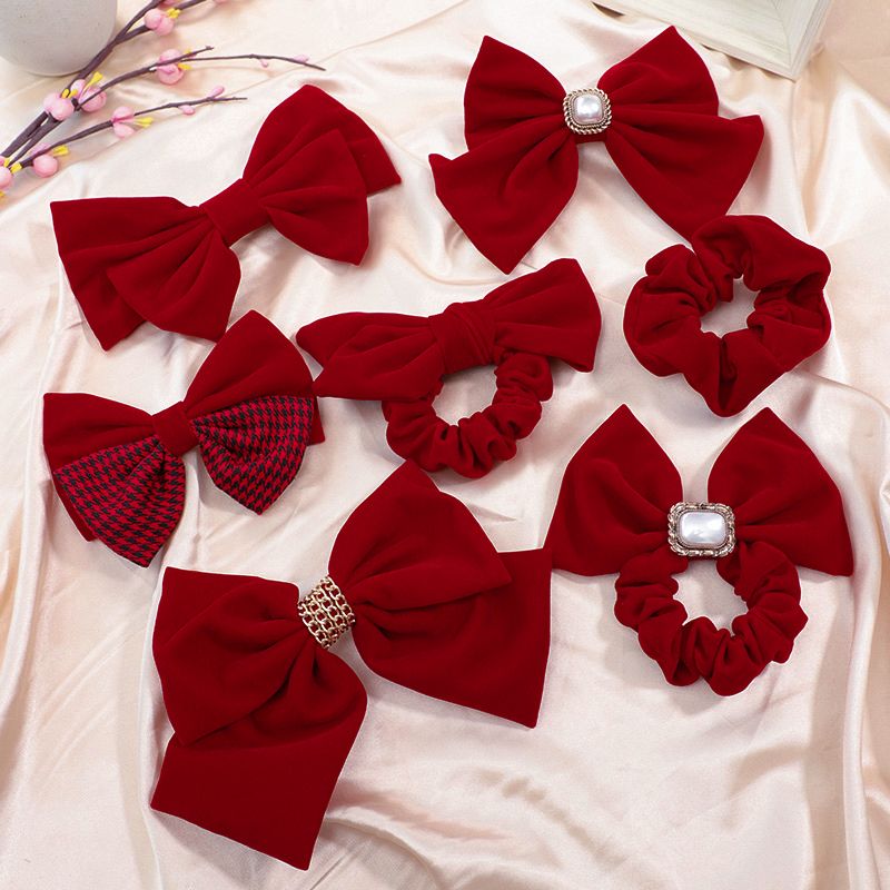The new red large bow headwear for brides in 2025, the wedding hair tie, the popular hairpin, the back of the head clip, summer